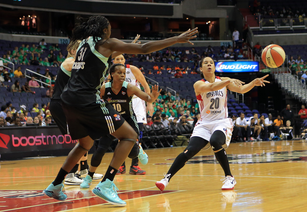 JULY 09 2015: Kara Lawson (20) of the Washington Mystics passes away from Tina Charles (31) of the New York Liberty during a WNBA game at Verizon Center, in Washington D.C.
Liberty won 79-76.
.